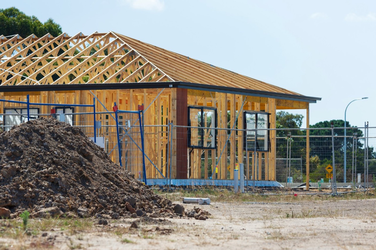 Room addition being framed with new roof trusses