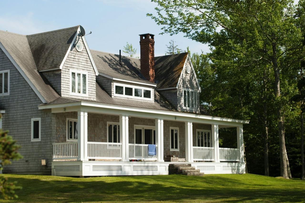 Custom home with a wraparound porch built in the Oklahoma City area